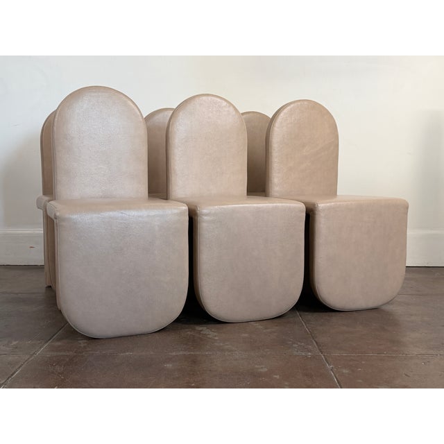 Set of six leather chairs in great condition by Cuff Studio. Almond color leather. Great condition, minor scuffs. Price is...