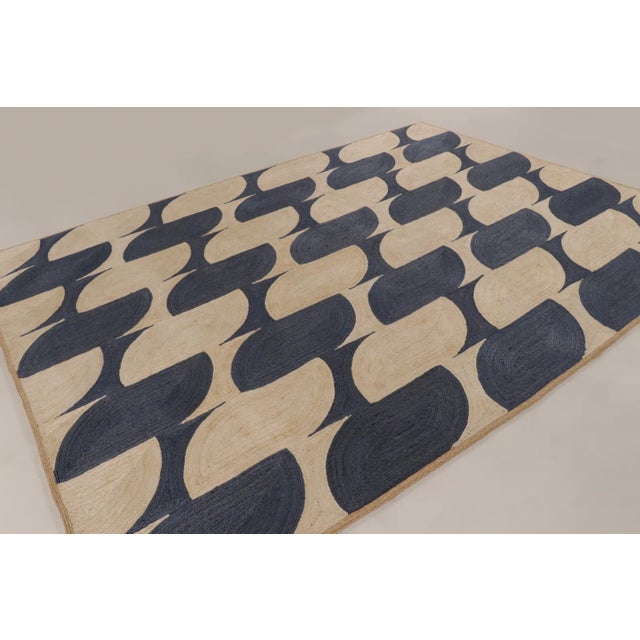 Handmade in natural abaca, this 9x12 contemporary rug joins Rug & Kilim’s Modern collection, showcasing a special-weave...