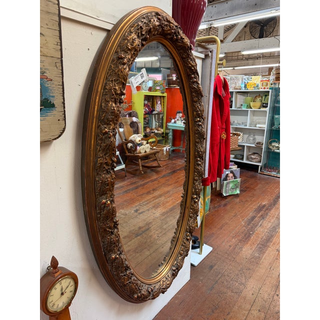 Antique Victorian Oval Gilt Mirror With Floral Relief Frame For Sale - Image 4 of 4