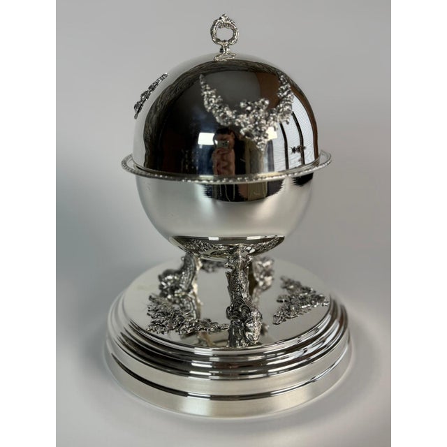 A sculptural globe-form caviar server hand-finished by master silversmiths in Istanbul's Grand Bazaar. Silver plated brass...