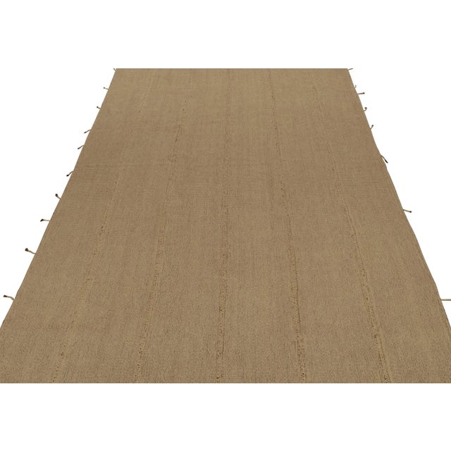 Handwoven in wool, a 10x15 Kilim from a bold new line of contemporary flatweaves by Rug & Kilim. On the Design: Fondly...