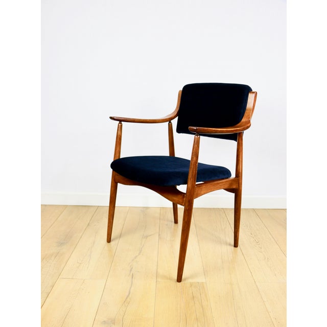 Danish office armchair, vintage office chair in navy blue. A Danish bentwood executive chair from the 1970s. The wooden...
