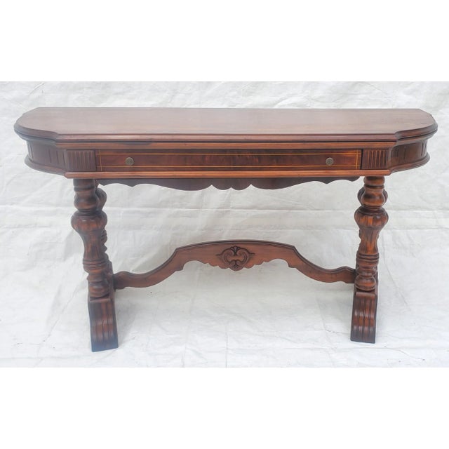 Beautiful antique console table. Beautiful Spanish Revival style with the bulbous Jacobean legs. Book matched burl walnut...