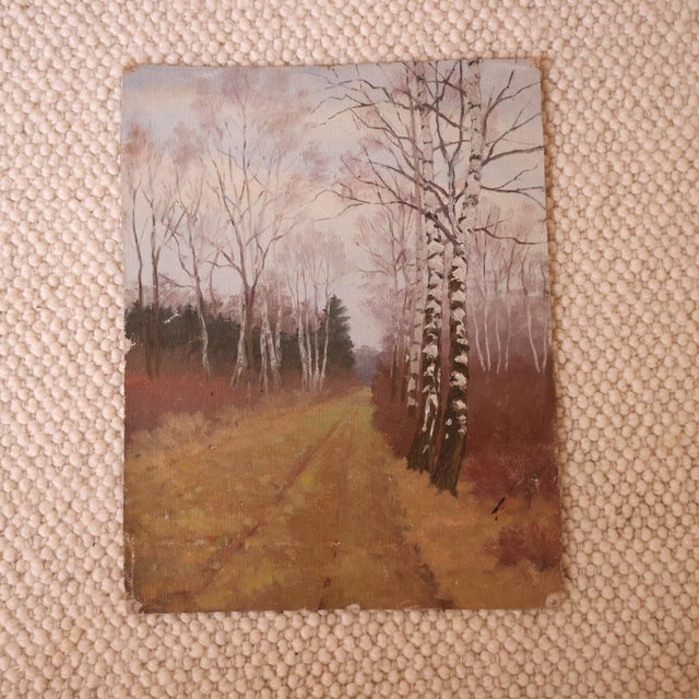 This 20th century French forest road painting captures a quiet woodland scene with a soft, atmospheric palette and a sense...