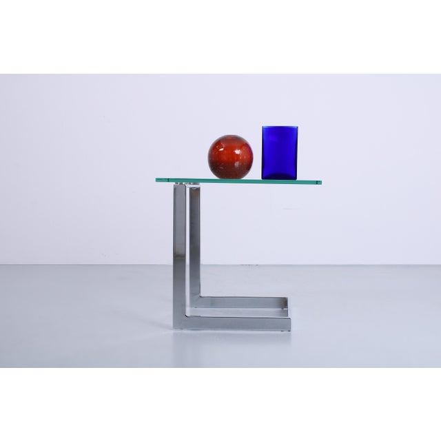 Cutting-edge chrome-plated steel side table by Gebra, Germany, dating from the 1980s. A striking combination of Bauhaus...