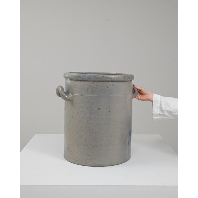 1900s Belgian Ceramic Pot. This sturdy, utilitarian ceramic pot reflects the practical craftsmanship characteristic of...