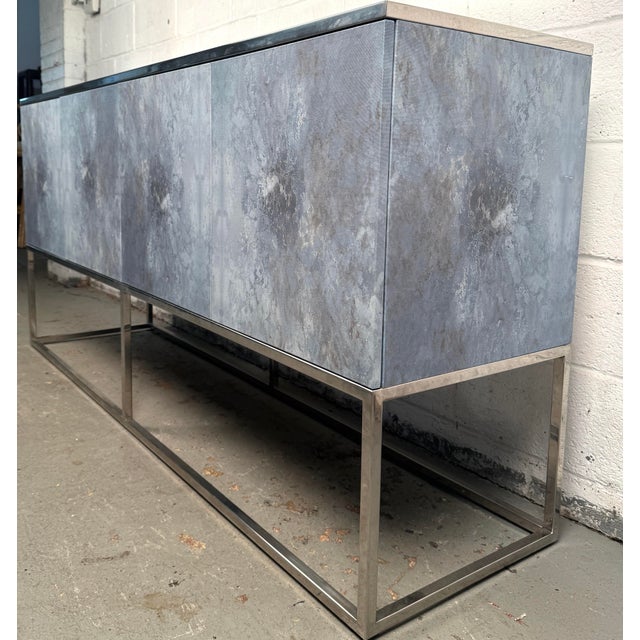 Make a statement with this stunning John-Richard Clayton Giovanna Buffet, a masterfully designed piece that captures the...