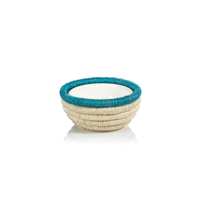 Creating beautiful presentation for your favorite condiments, our hand-woven bowl brings natural beauty and texture to the...