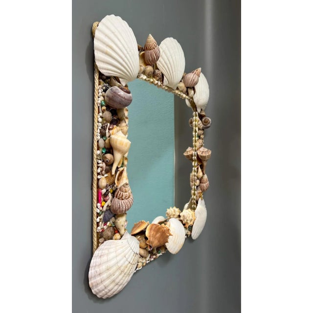 Stunning, coastal square mirror. Handmade in the mid-late 20th century. Large white scallop shells and assorted shells...