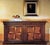 Handcrafted in Italy from solid walnut, this Tuscan sideboard features an antique distressed finish and traditional Old...
