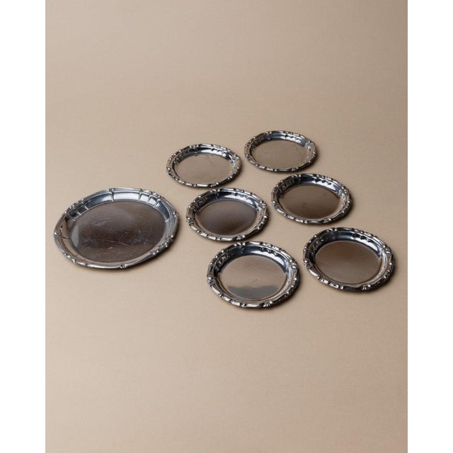 Timeless elegance with these 7 vintage stainless steel coasters from the 1980s. 6 smaller ones for wine or water glasses...