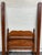 This is a stunning vintage, probably antique, Federal or Empire style twin sized American tiger maple bed. Features shaped...