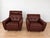 Crafted by Svend Skipper, this exquisite lounge chair set boasts a sleek design and comfort. Upholstered in soft leather,...