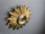 Gilded resin sunburst mirror with convex mirror glass. The golden mirror is in a good condition. 1960s - made in Belgium....