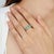 This elegant half eternity band is crafted in 925 sterling silver, featuring 1.38 carats of oval-cut emeralds arranged in...