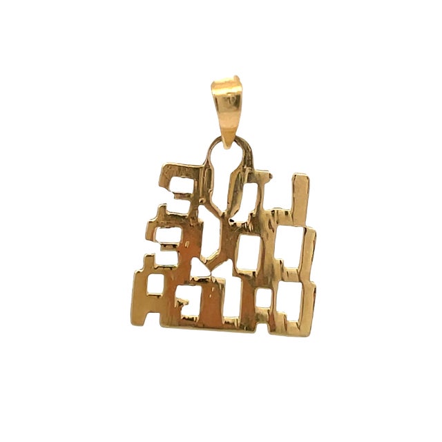 14K yellow gold “Live Love Laugh” charm pendant featuring an open cut-out letter design. Measures approx. 18.5mm with...