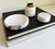 A handsome table lighter and ashtray set made of Carrara marble with ribbed bandings. Remove the lighter's lid to reveal a...
