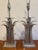 Pair of cast aluminum table lamps in a stylized leaf/palm frond form. These are in working condition with original wiring....