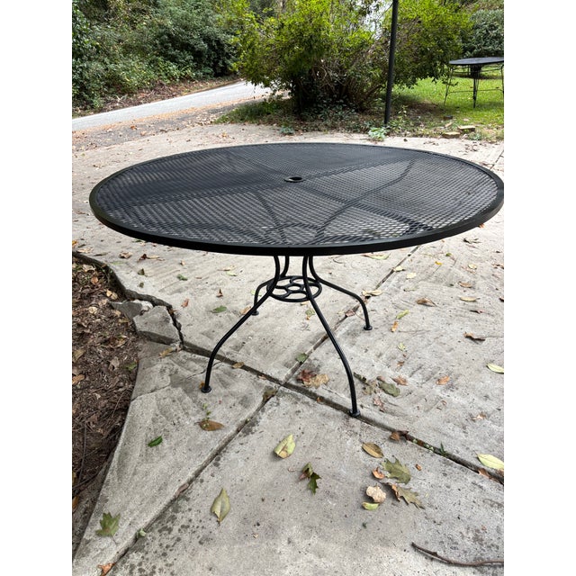 heavy iron salterini iron 48 inch pool side table. recently sandblasted, primed and painted... also sealed, to withstand...