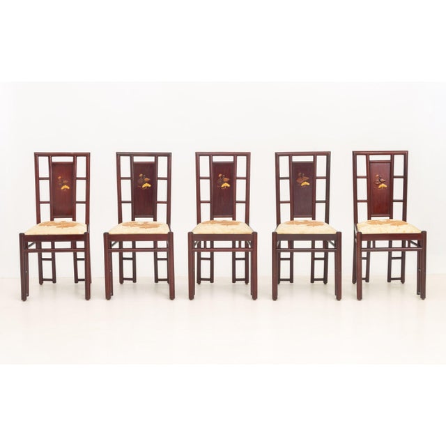 Set of Five Chinese Duck Motif Multi-Wood Inlaid Dining Chairs, with upholstered seats. 35.75" H x 17.5" W x 17" D; seat:...
