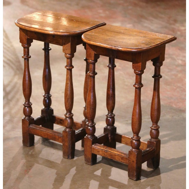 This elegant pair of antique side tables was crafted in Normandy, France circa 1780 and reflects the restrained,...