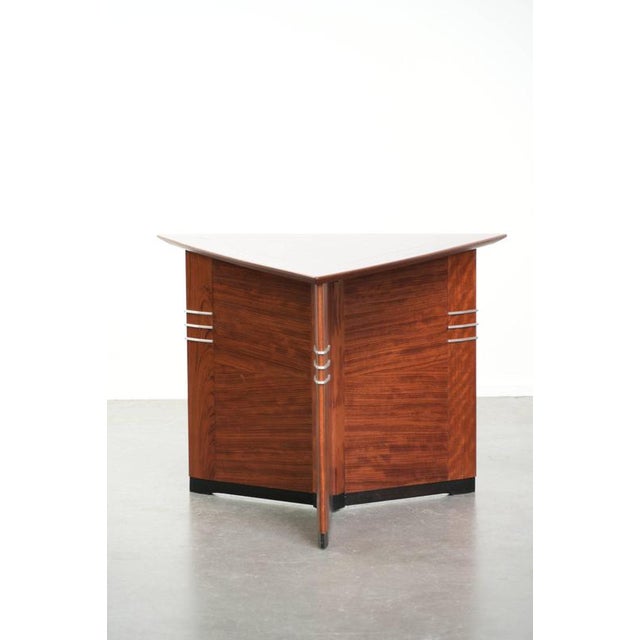 This beautiful triangular Art Deco design coffee/side table by Schuitema, in good condition, comes from the Decoforma...