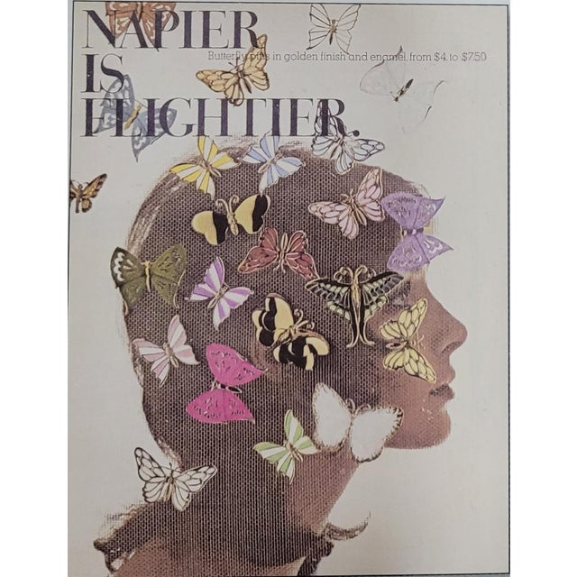 Goldtone green and blue plique-a-jour butterfly brooch with security clasp. Marked "NAPIER" on the back of the butterfly's...