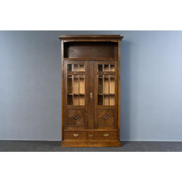 Object: Bookcase Era & Style: Art Nouveau - beginning of the 20th century Features - elegant and practical furniture with...