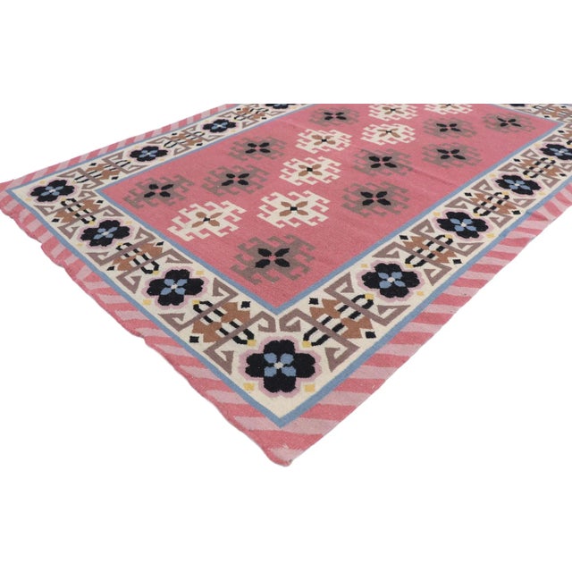 , vintage Romanian Geometric Kilim rug with boho chic Tribal style. Showcasing a bold expressive design, incredible detail...