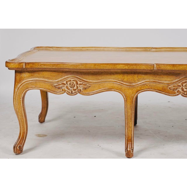 Beautifully crafted by Judson Rothschild, this substantial Italian Rococo Revival coffee table captures the graceful...