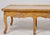 Beautifully crafted by Judson Rothschild, this substantial Italian Rococo Revival coffee table captures the graceful...