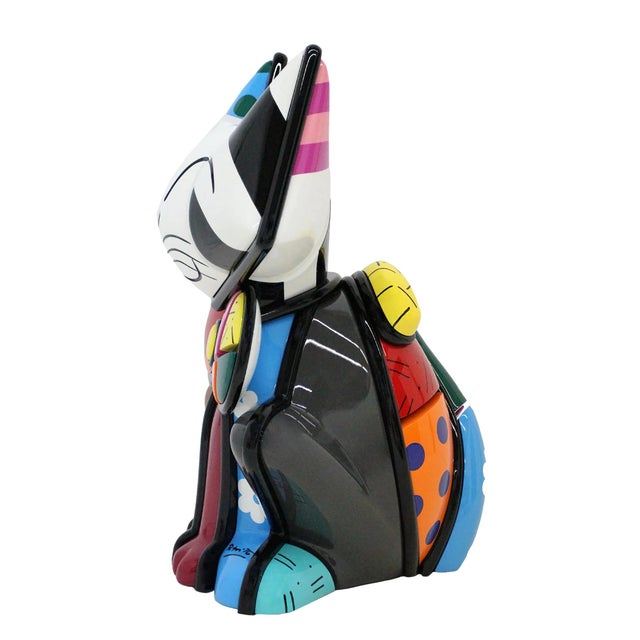 Resin, enamel and wood sculpture. Hand signed by Romero Britto. Hand numbered 37/100. Size: 24 x 18 x 16 inches....