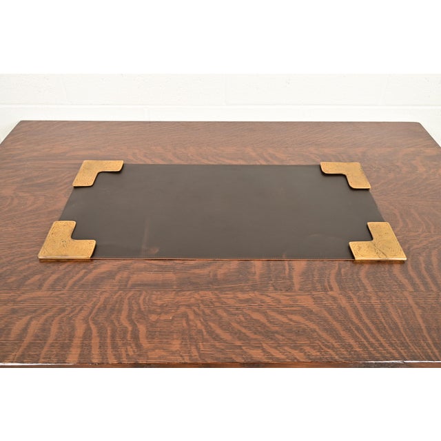 A gorgeous set of four Art Deco or Arts & Crafts period gilt bronze blotter corners featuring symbols of the Zodiac, with...