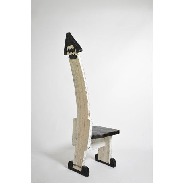 Pair of bicolor tainted wood chairs totems, 1980s. Height: 165 cm - 64.96 in Length: 47 cm - 18.5 in Width: 67 cm - 26.38 in