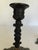 Bring timeless European elegance to your home with this beautiful pair of vintage solid brass candlestick holders,...