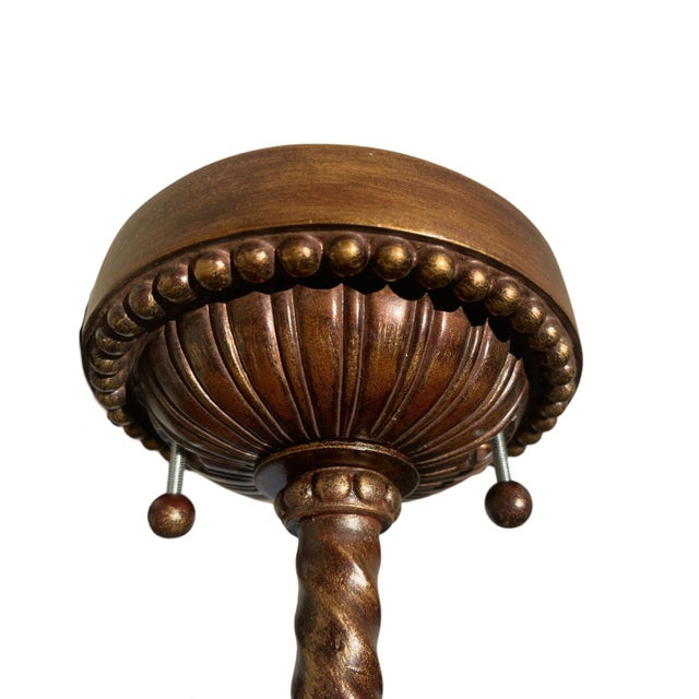 An elegant wall sconce from the Scheherazade collection by Fine Art Lamps, featuring meticulously crafted metalwork in an...