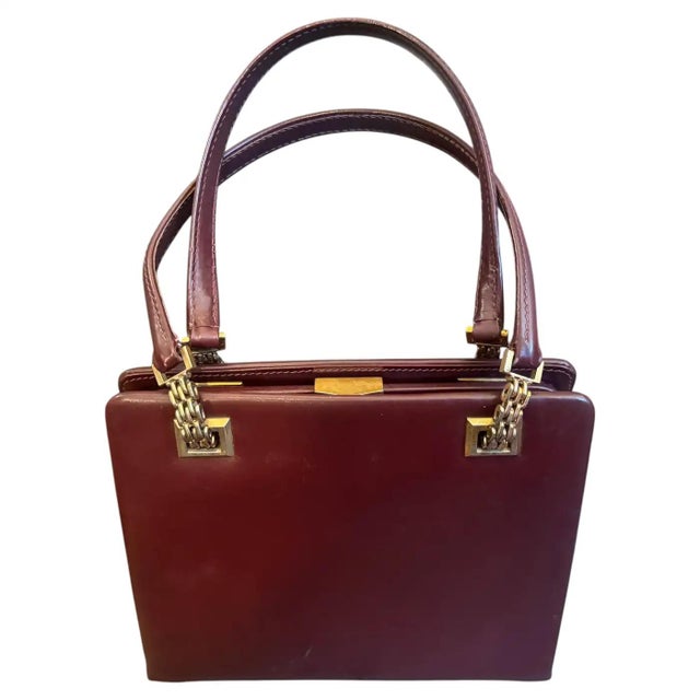 This exceptionally rare vintage Gucci evening bag is a magnificent showcase of mid-century Italian luxury, beautifully...