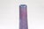 A multicolor purple, blue, pink and white ceramic vase with tapering lines. This vibrant ceramic vase, with its eye-...