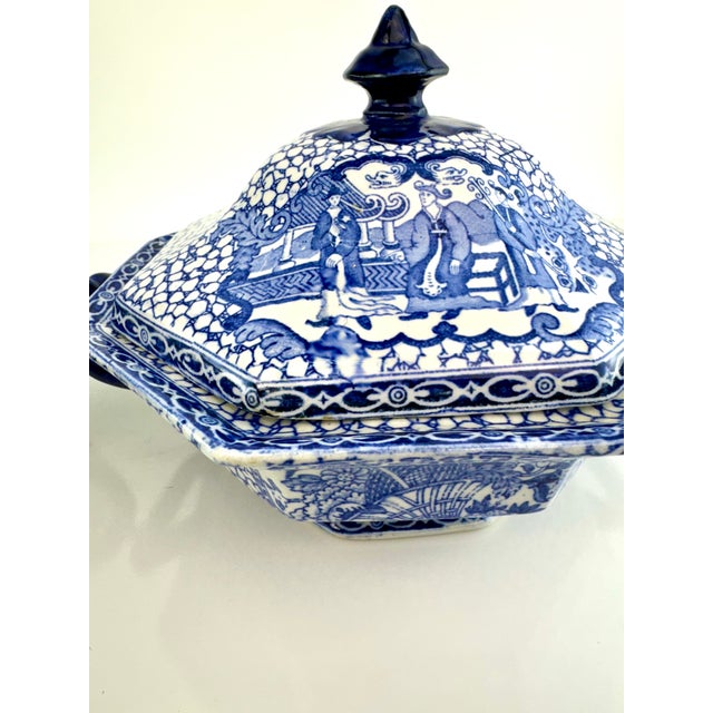 This exquisite pair of antique lidded tureens by William Adams is a testament to English craftsmanship and design...