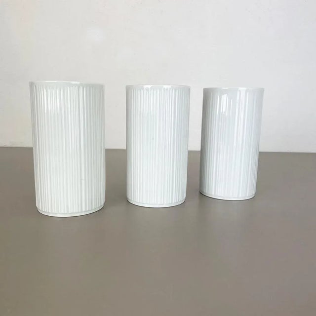 Article: Op Art porcelain vases set of 3 Producer: Melitta Minden, Germany Age: 1970s This original vintage OP Art vase...