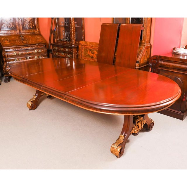 A fantastic antique Victorian dining set comprising an antique Victorian mahogany and parcel gilt twin pedestal dining...