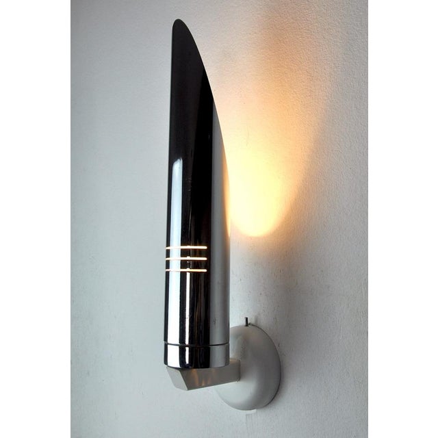 Very space age tubular wall light produced in Italy in the 1970s. Chromed metal structure. Unique object that will...