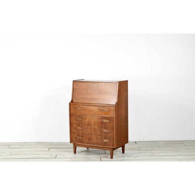 Mid-Century Modern Teak Secretaire from Jentique, 1960s, in Very Good conditions. Designed 1960 to 1969 This piece has an...