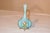 19th century satin glass cruet in a lovely blown form with applied glass handle and feet painted in gold. There are hand...