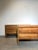 Minimalist brutalist sideboard crafted entirely from solid wood. The piece features a clean architectural silhouette with...