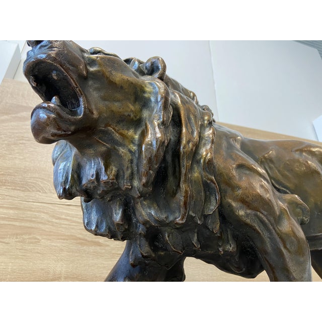 Elegant and solid Original Animal Sculpture from the 19th Century. Made in France Representation of a Large Lion in...