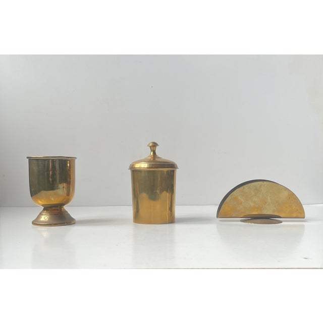 Vintage desk or vanity set consisting of a stylish (bend circle) napkin holder a lidded and an open jar/vase/cup....
