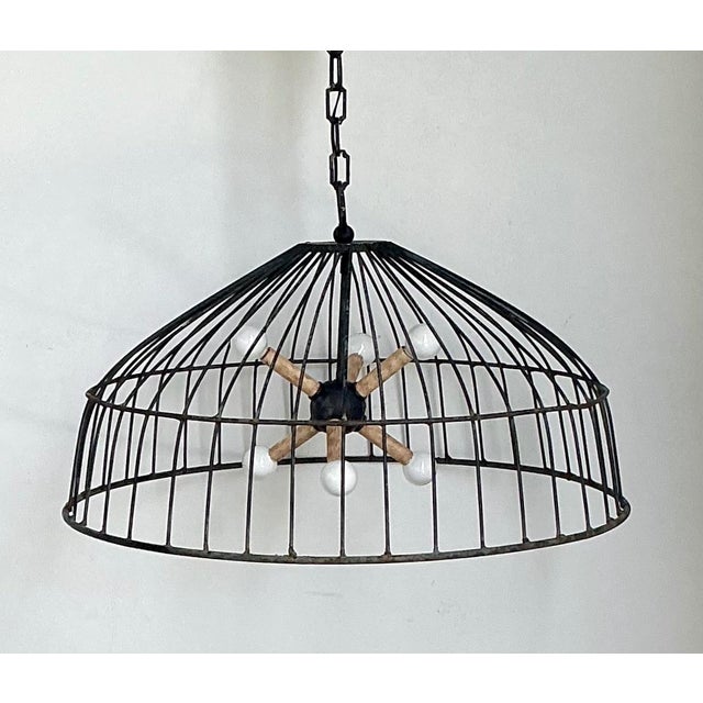 Make a dramatic statement with this vintage monumental industrial pendant light, expertly crafted from iron and wood in...