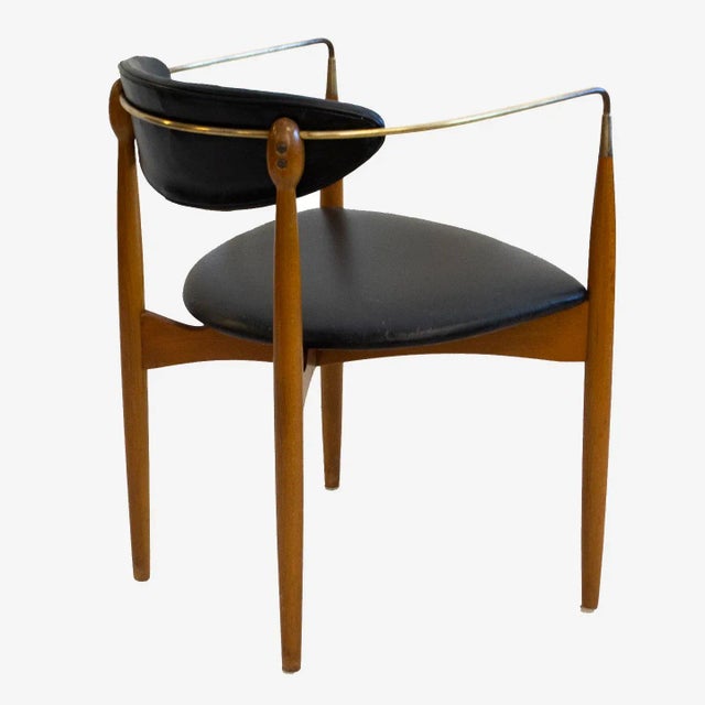 This Dan Johnson Viscount chair is in its original condition. It has a lovely patina and has kept its structural integrity...