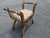 An Italian carved-wood curule stool, with upholstered seat, from the mid 20th century. This mid-century stool from Italy...